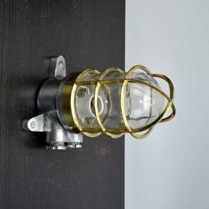 Vintage polished aluminium wall lamp with brass cage for nautical UK homes